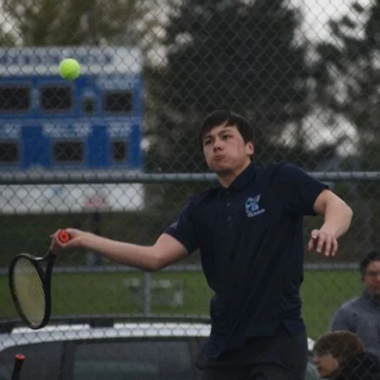 me playing tennis